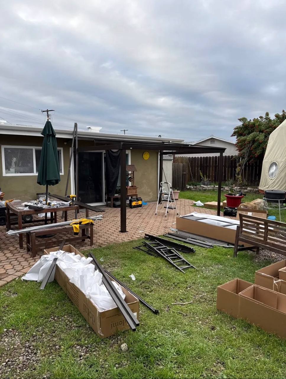 Patio enclosure during assembly.